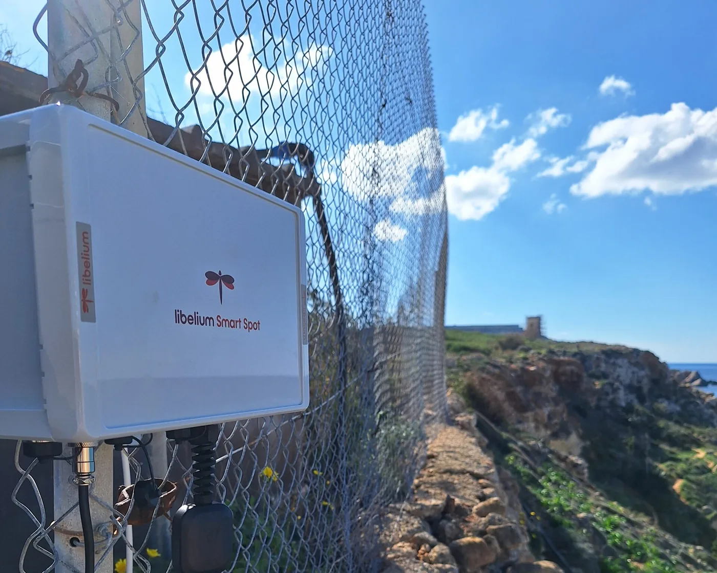 Libelium Smart Spot installed on a fence above the coast in Malta